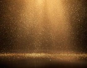 Digitally generated image of falling gold particles, 完全适用于各种各样的主题，如圣诞节, luxury, success, celebration, etc.